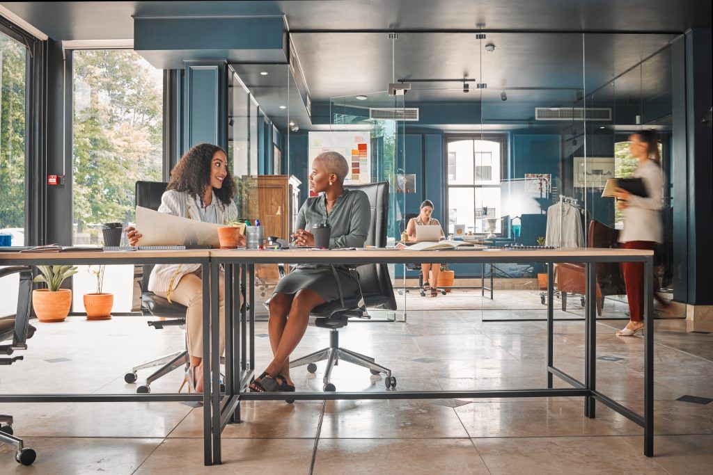 Shot of a group of female designers working in an office